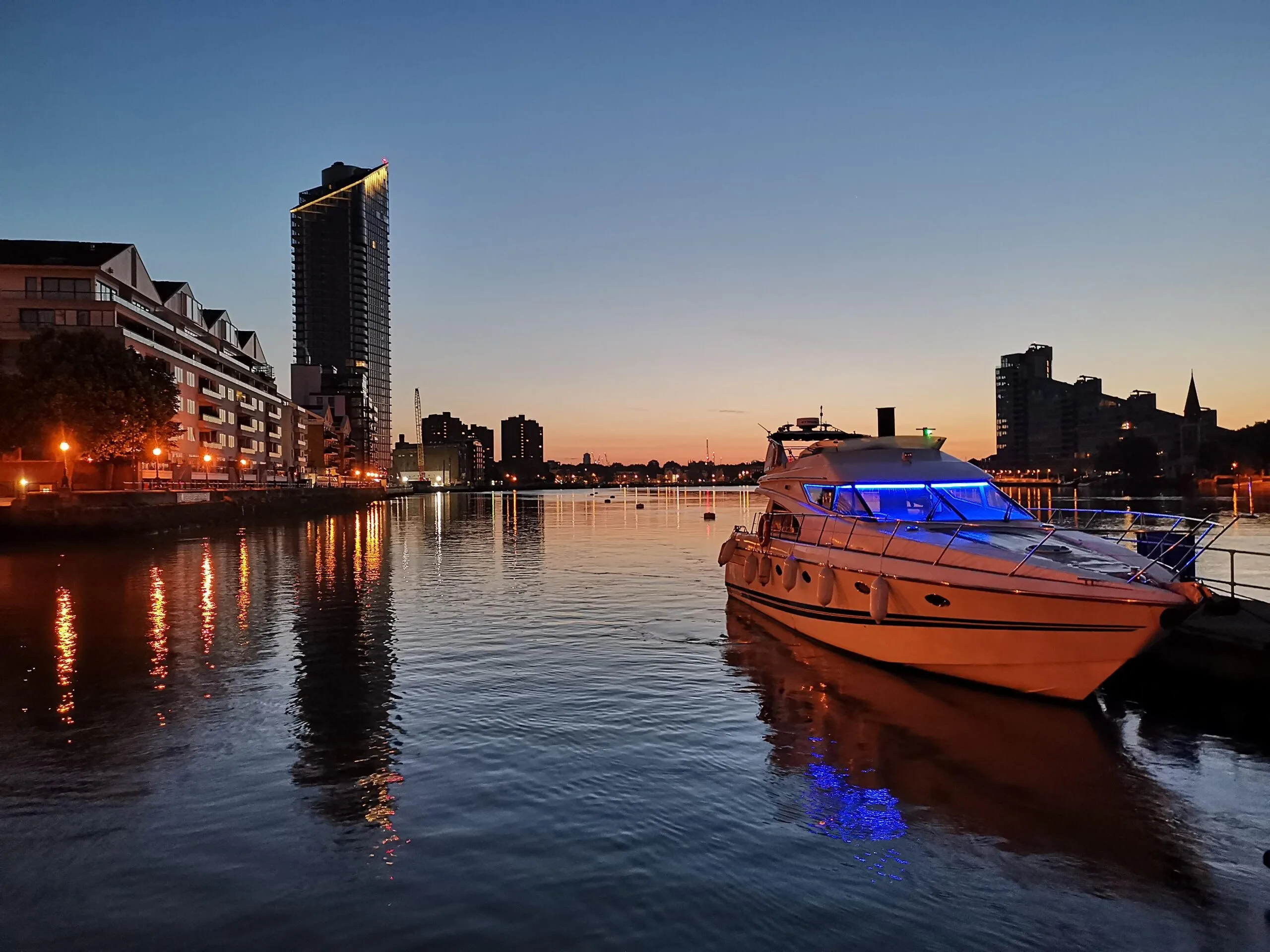 Yacht at sunset on London waterfront