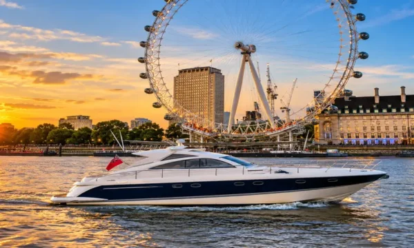 Luxury yacht on River Thames sightseeing cruise in London with London Eye